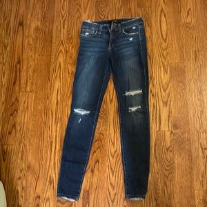 Joe’s brand distressed jeans. Good condition. Some stretch.